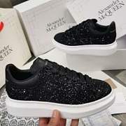 McQveen shines black. - 2