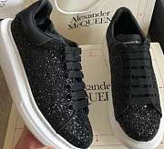 McQveen shines black. - 3